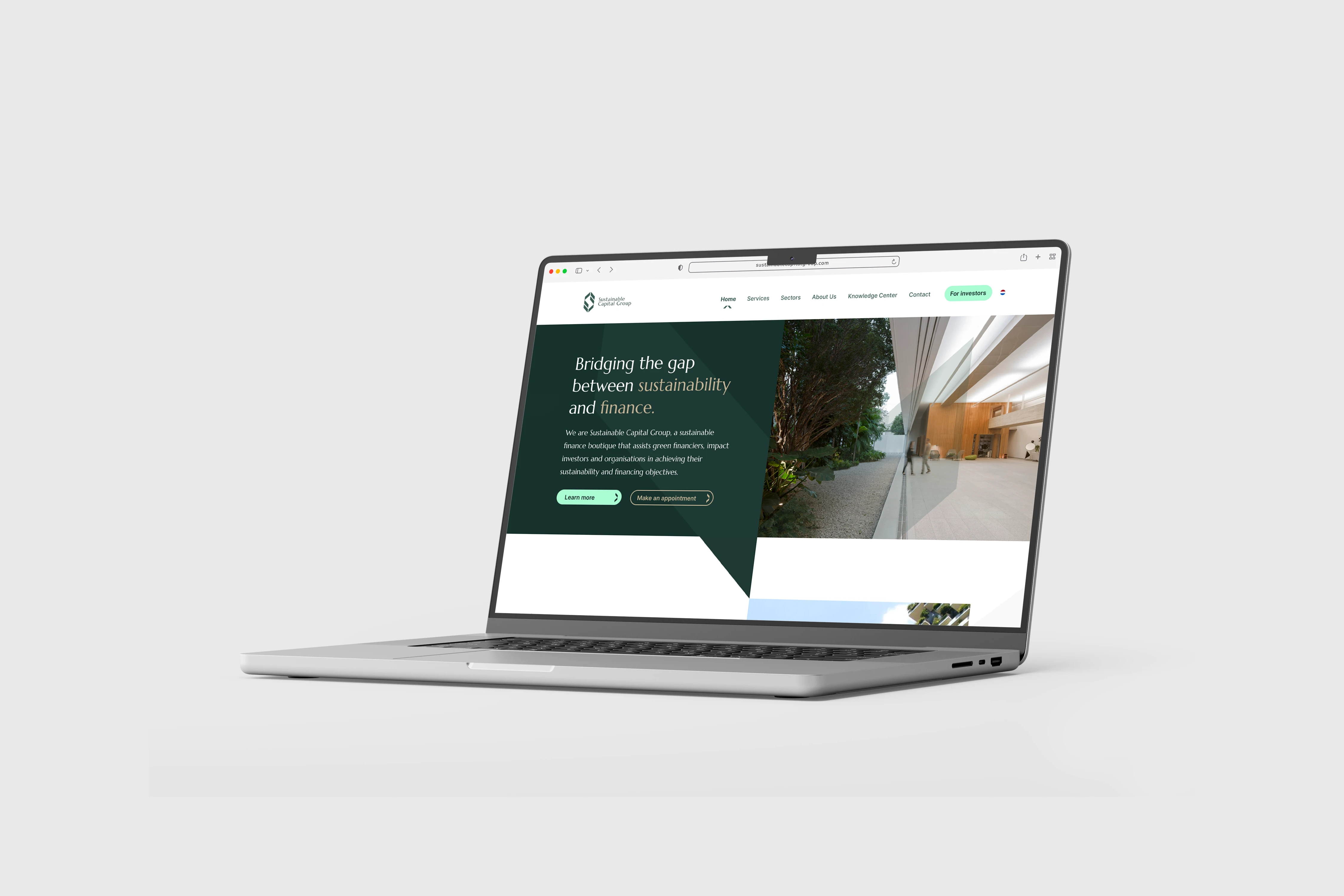 Sustainable Capital Group website on laptop mockup