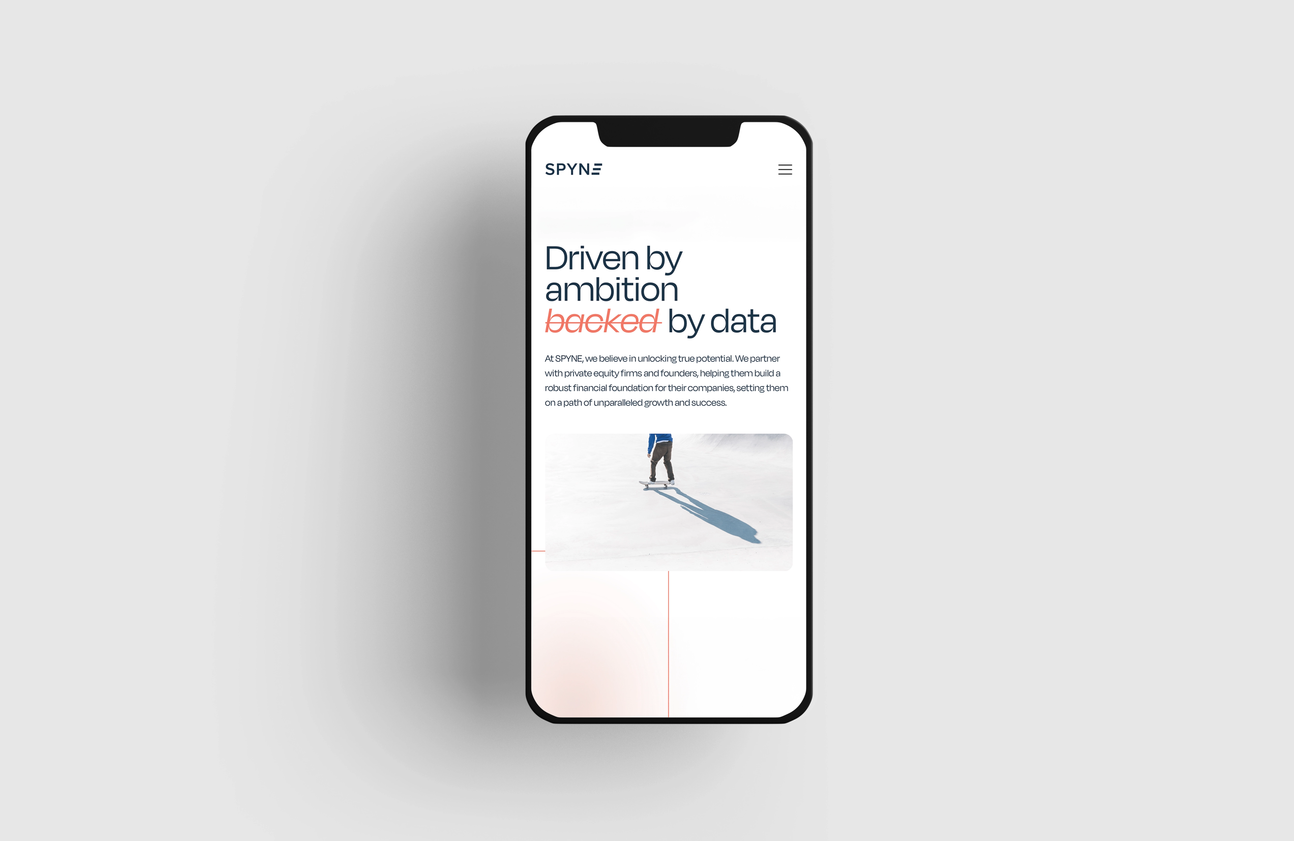 Spyne website on iPhone mockup — mobile responsive design